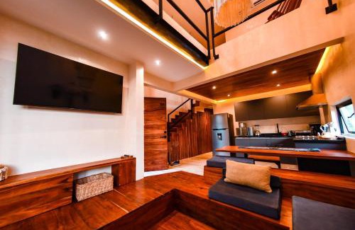 La Veleta Apartment | A double-height apartment with a private pool