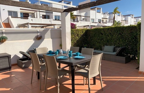 Alhama de Murcia Apartment | A fresh modern apartment on a lovely garden with a shared pool