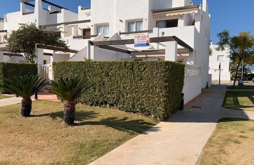 Alhama de Murcia Apartment | A fresh modern apartment on a lovely garden with a shared pool