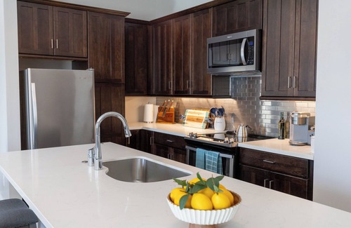 Galveston Condo | A Gem on the Strand! Steps from Galveston's fine dining and entertainment