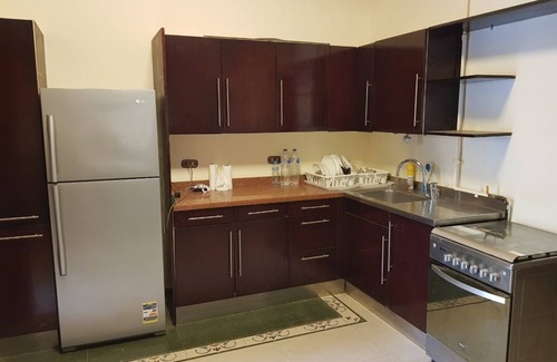 The 5th Settlement Apartment | A gorgeous high level ground apartment with private garden and private entrance.
