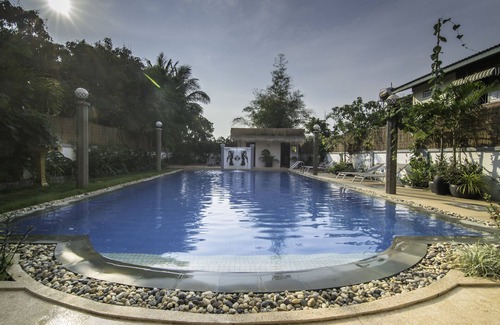 Siem Reap House | A home away from home! Coliving building with private rooms and shared areas.