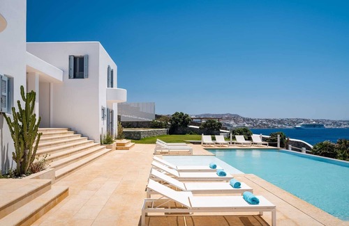 Agios Stefanos Villa | A luxurious haven of beachfront comfort and elegance!
