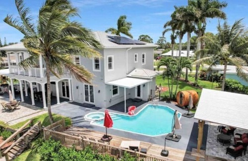 River Park House | A Luxury Waterfront Estate with Cinema, Pool & Kayaks!