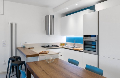 Riccione Apartment | A modern space just steps away from the sea, perfect for an exclusive vacation.