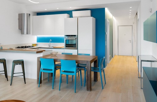Riccione Apartment | A modern space just steps away from the sea, perfect for an exclusive vacation.