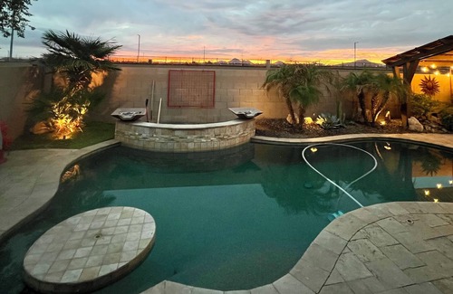 Buckeye House | A pet-friendly cozy 4 bedroom home with a resort style pool in the backyard.