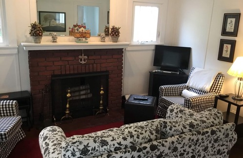 Lakeside Cottage | A picture perfect restored original cottage located inside the gates of Lakeside
