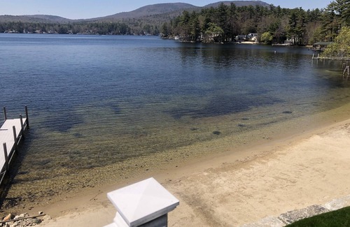 Alton Bay House | A quiet cove, the sunset and a sandy beach, on Lake Winnipesaukee