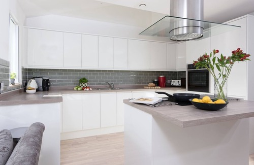 Newquay House | A stylish eco mews house with four bedrooms, enclosed garden and parking in Newquay