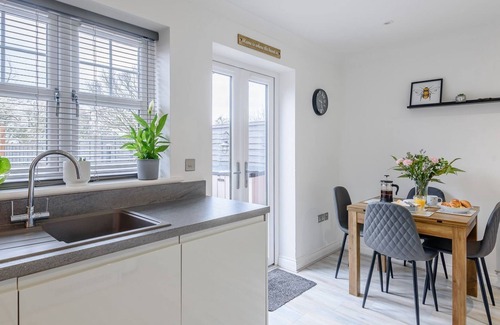 Woodhall Spa Cottage | A superb modern house with a hot tub set under a gazebo with twinkling fairly lights.