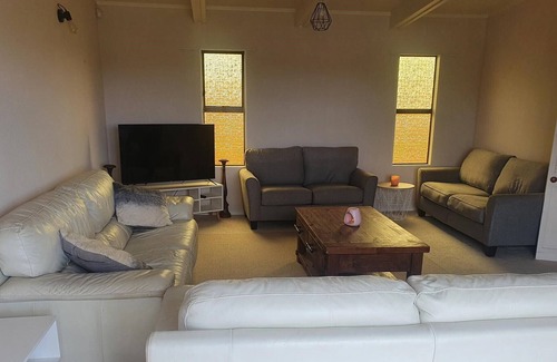 Foxton Beach House | A tidy treasure close to the beach! Enough space for the whole family.