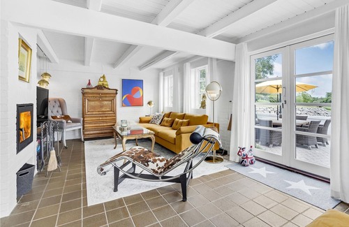 Sydals House | A unique gem of a vacation home located in a scenic setting right on the water.