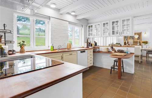 Sydals House | A unique gem of a vacation home located in a scenic setting right on the water.