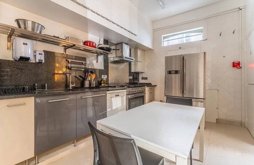 Arsenal Apartment | A Verdant Escape:580m2:Expansive Townhouse Nestled in a Marais Cul-de-Sac