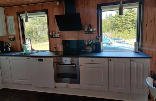 Houstrup Cottage | A wooden house on the beautiful West Coast with the width beautiful beaches.