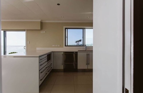 Bell Block Apartment | ABC on Wanaka Bay - beachfront home w. ocean views