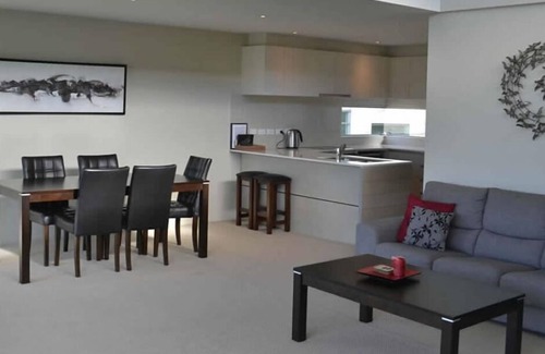 Taupo Apartment | Absolute waterfront apartment. Stunning river views. Swimming pool and kayaks.