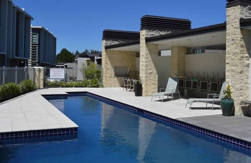 Taupo Apartment | Absolute waterfront apartment. Stunning river views. Swimming pool and kayaks.