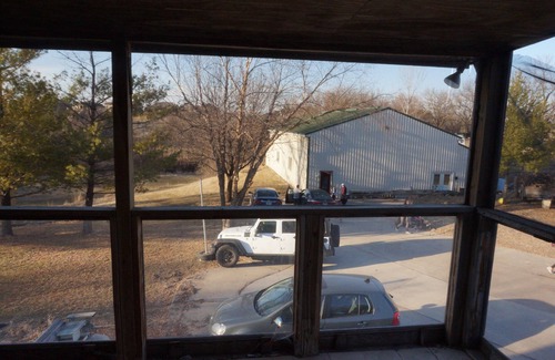 Urbandale House | Acreage InTown 4 BR, 2 Bath 3,300 sq ft half house option with gymnasium.