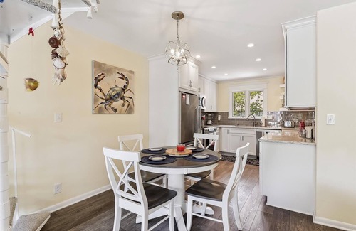 Bethany Beach House | Activities included up to $300 FREE PER WEEK! Bright and pretty second-floor 3-bedroom, 2-bath Sea Colony unit with all of the modern conveniences