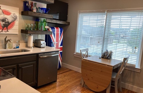 Sweetwater Apartment | Adorable balcony apartment. Walk to shops and restaurants.