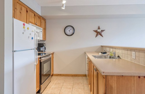 Silver Star Mountain Apartment | Affordable Fully Equipped Creekside Studio - Shared Hot Tub and Laundry