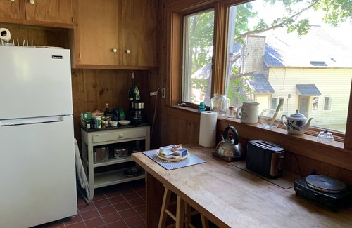 Gloucester Cottage | Airy, book-lined cottage on historic seaside estate with private beaches & more