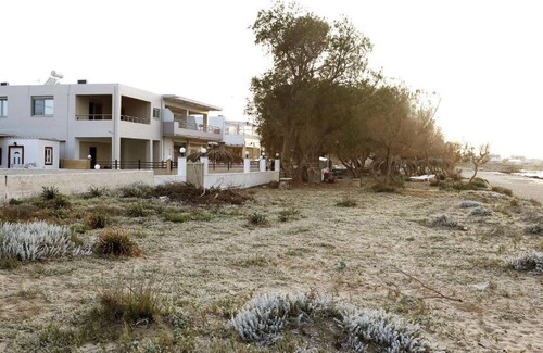 Stavros Apartment | Akrotiri Seaside Project: Beachfront Villa with Seaview, a Haven on the Beach