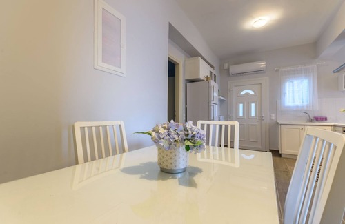 Apraos Apartment | Alisachni-Steps from the sea by Corfu Stay Solutions