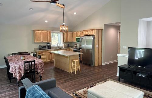 Great Cacapon House | All Decked Up - wifi, view, river access, fire pit, 3 bedrooms, games, family friendly