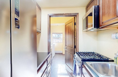 Florissant House | All-new garage conversion apartment with wood stove & washer/dryer