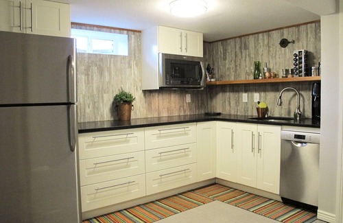North Park Hill Apartment | ALL the amenities! Park Hill Garden Level Guest Apartment.