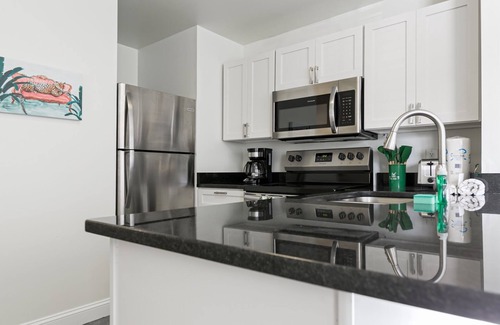Helen House | Alpine River Suites #403 - Cozy Condo Right On The River in Downtown Helen