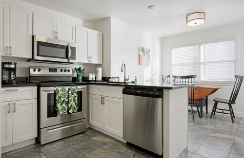 Helen House | Alpine River Suites #403 - Cozy Condo Right On The River in Downtown Helen