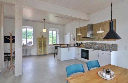 Baustert Apartment | Alte Schule - Modern Wohnen in historischen Altbau