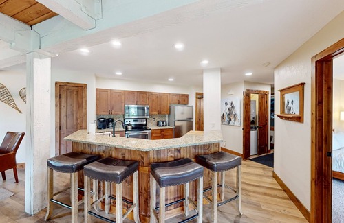 Steamboat Springs Condo | Amazing condo next to Steamboat skiing with hot tubs, pool & washer/dryer