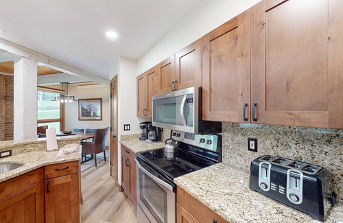 Steamboat Springs Condo | Amazing condo next to Steamboat skiing with hot tubs, pool & washer/dryer
