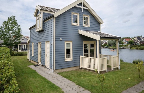Municipality of Nissewaard House | Amazing holiday home on water with terrace