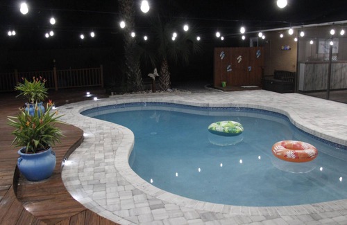 Crooked Creek House | Amazing home with heated pool, tiki bar and luscious outdoor close to beaches