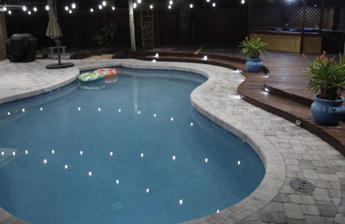 Crooked Creek House | Amazing home with heated pool, tiki bar and luscious outdoor close to beaches