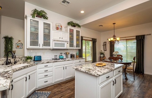 Bullhead City House | AMAZING Pool home with outdoor kitchen, firepit, and waterfall Close 2 Casinos!