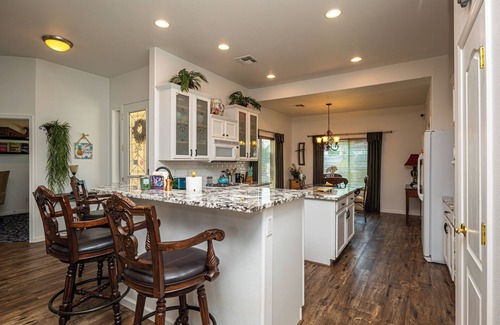 Bullhead City House | AMAZING Pool home with outdoor kitchen, firepit, and waterfall Close 2 Casinos!