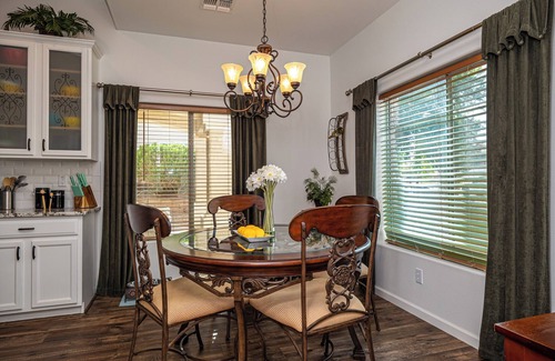 Bullhead City House | AMAZING Pool home with outdoor kitchen, firepit, and waterfall Close 2 Casinos!