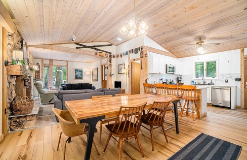 Lake Township House | Amazing riverfront retreat with firepit, patio, W/D, & great views
