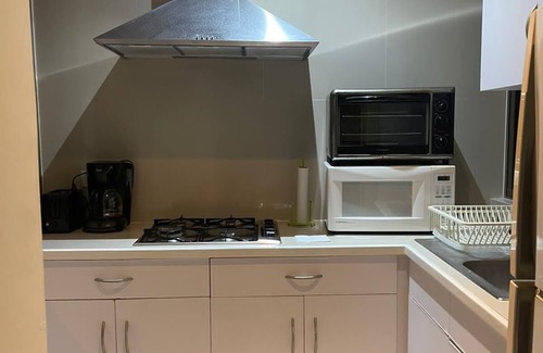 Luis Donaldo Colosio Condo | Amazing two bedroom condo steps from the beach