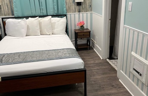 Jamestown Hotel | Americas Best Value Inn & Suites Royal Carriage