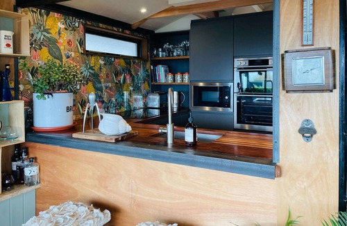 Whitstable Cottage | An amazing beach front property with log burner and stunning views.