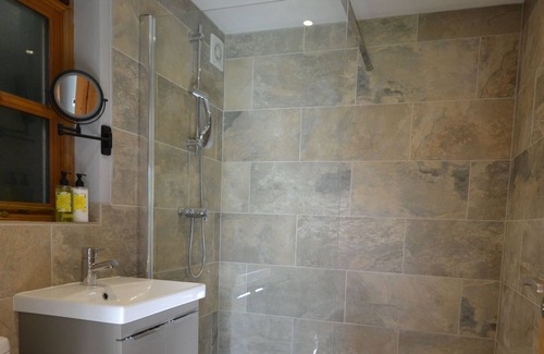 Aldington House | An attractive converted barn all set on ground floor level with 1 bedroom and en-suite shower room