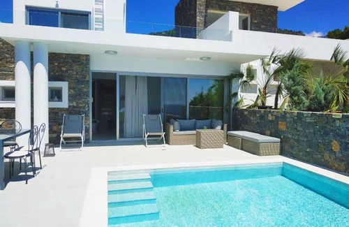 Pefki Villa | An exquisite and luminous seaside villa. The epitome of coastal serenity.